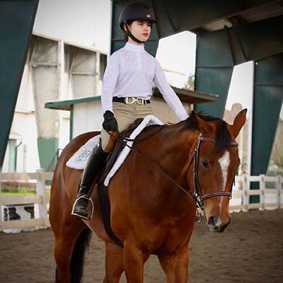 Deerfield Farm regional team member showing horse