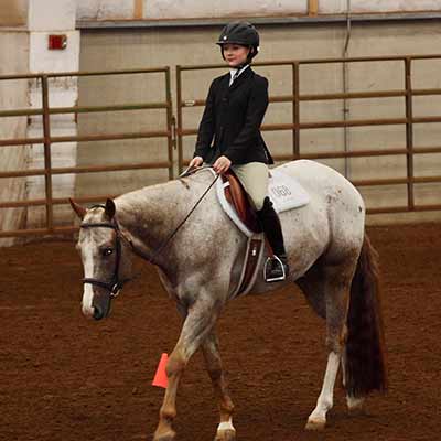 Deerfield regional team member showing horse